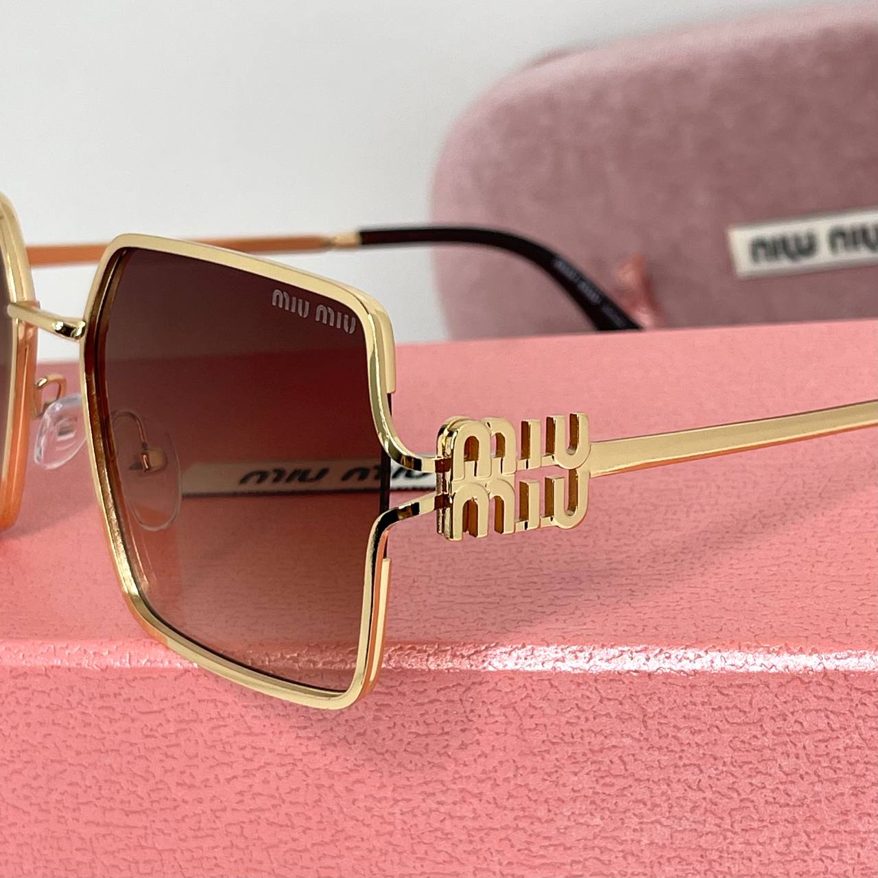 Miu Miu Luxe Gold