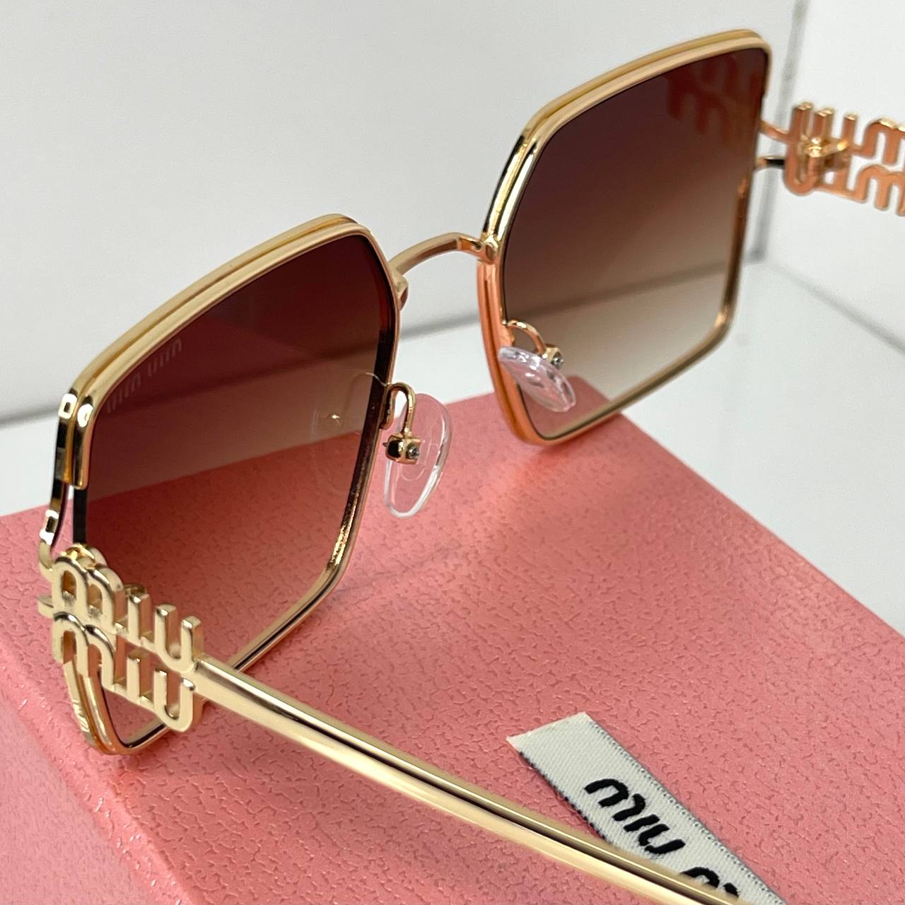 Miu Miu Luxe Gold