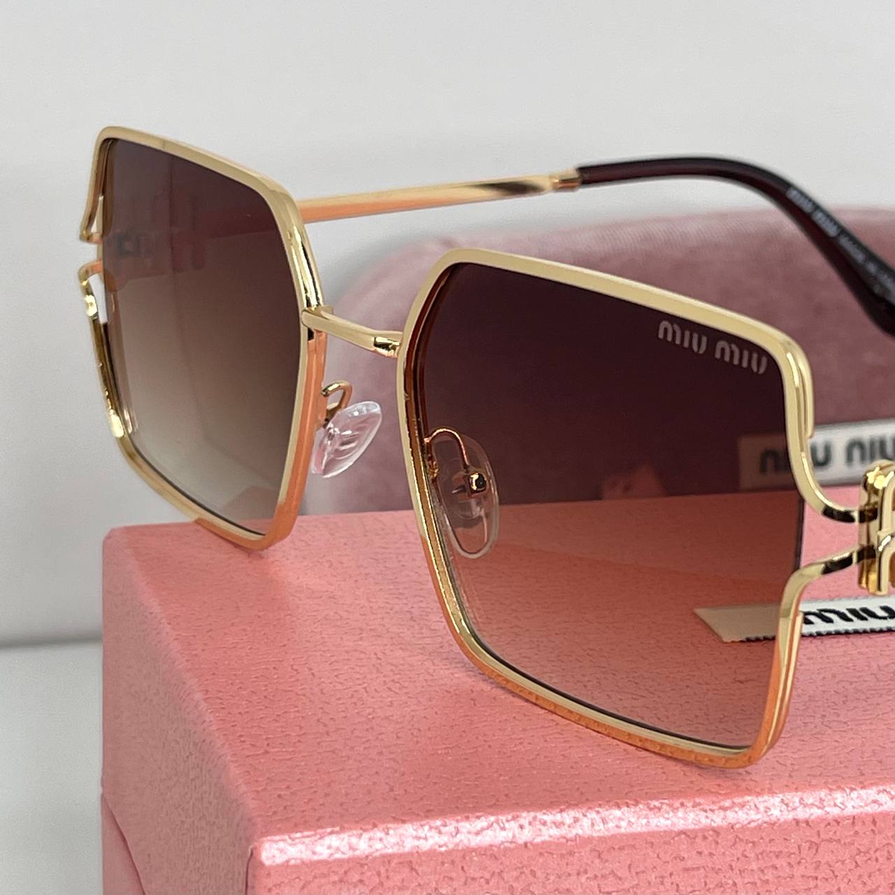 Miu Miu Luxe Gold
