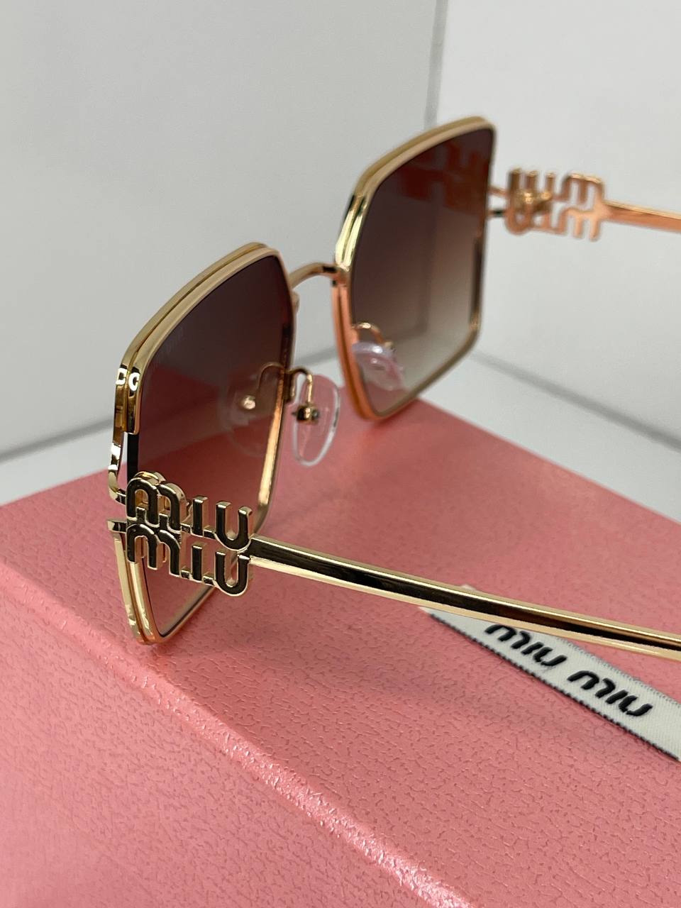 Miu Miu Luxe Gold
