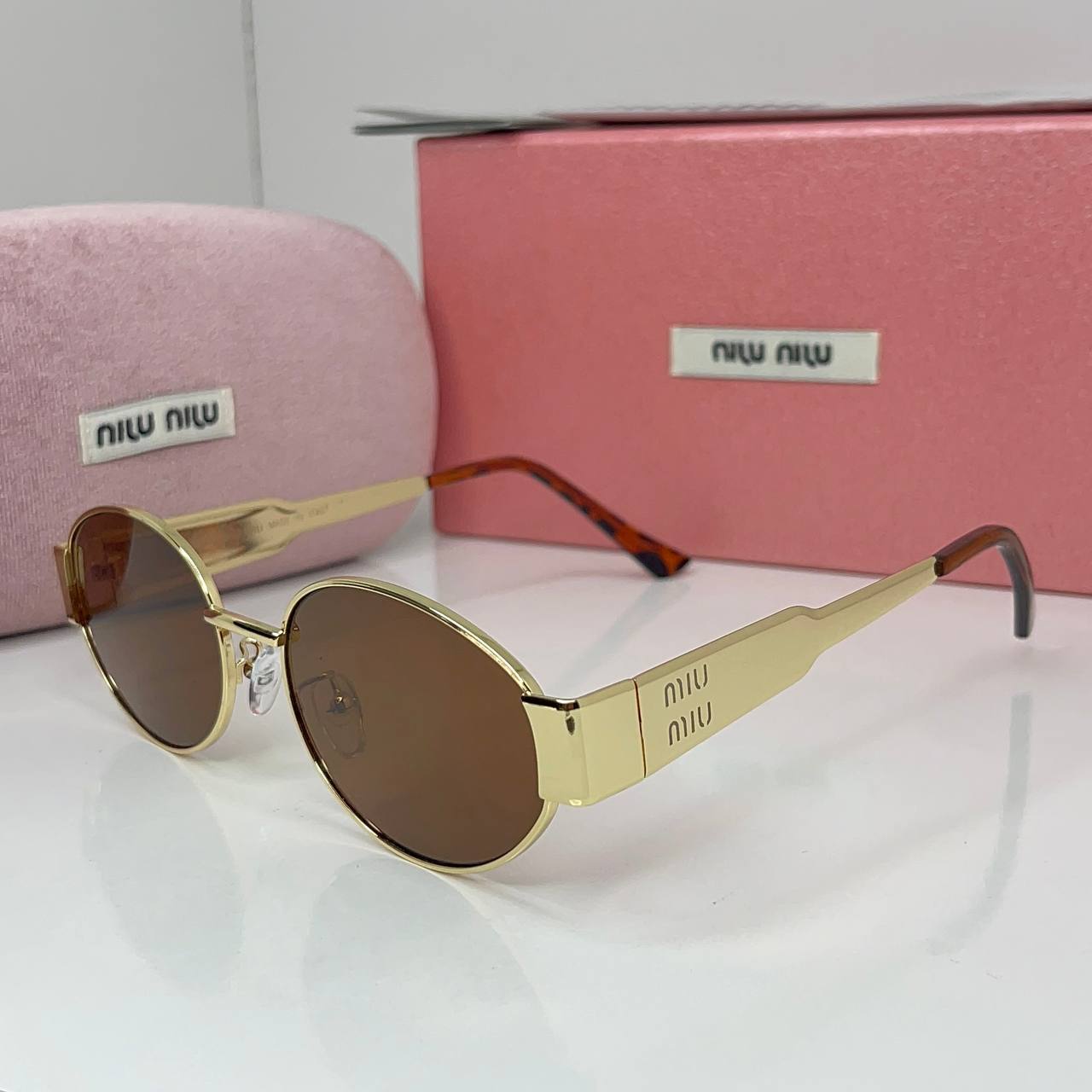 Miu Miu Vision Gold