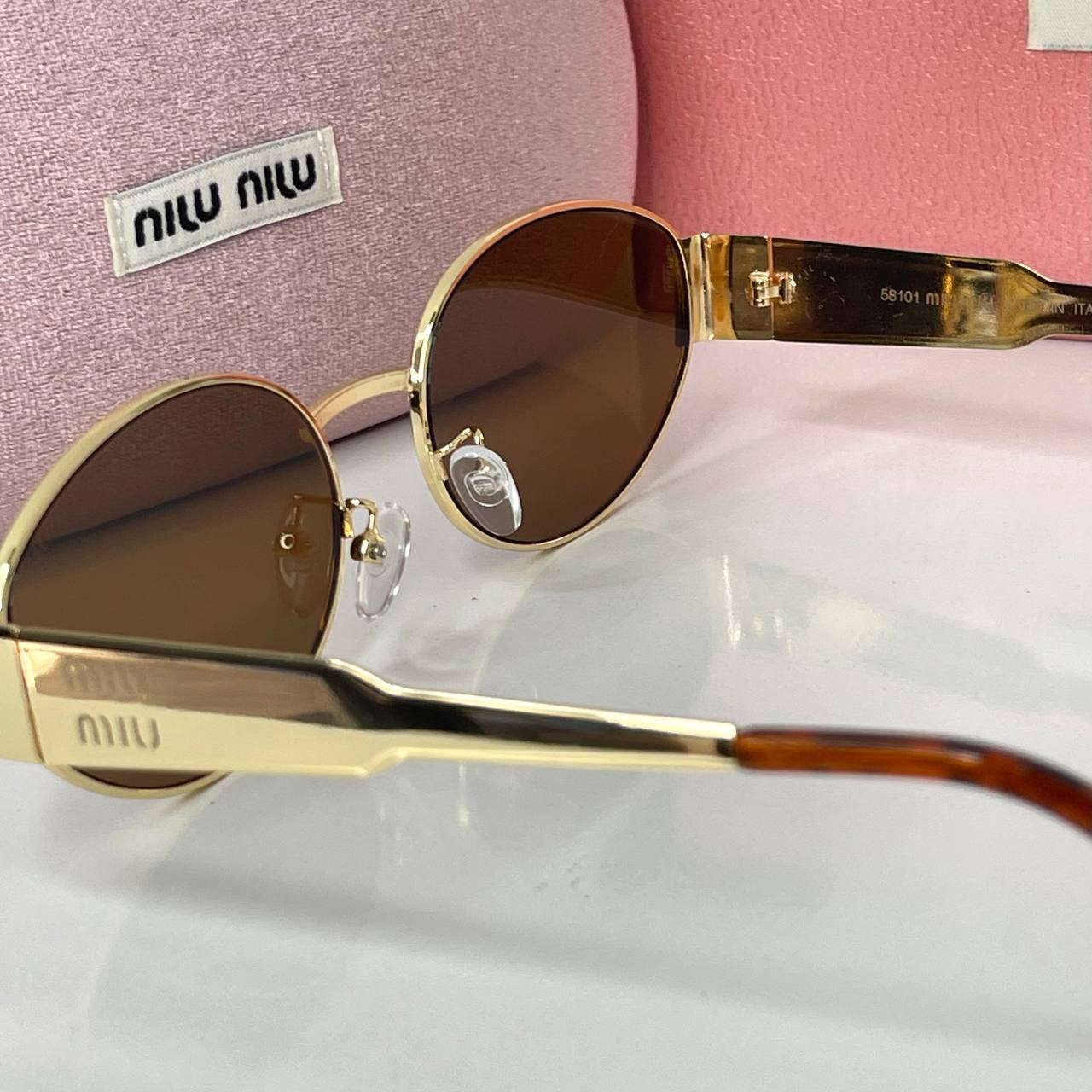 Miu Miu Vision Gold