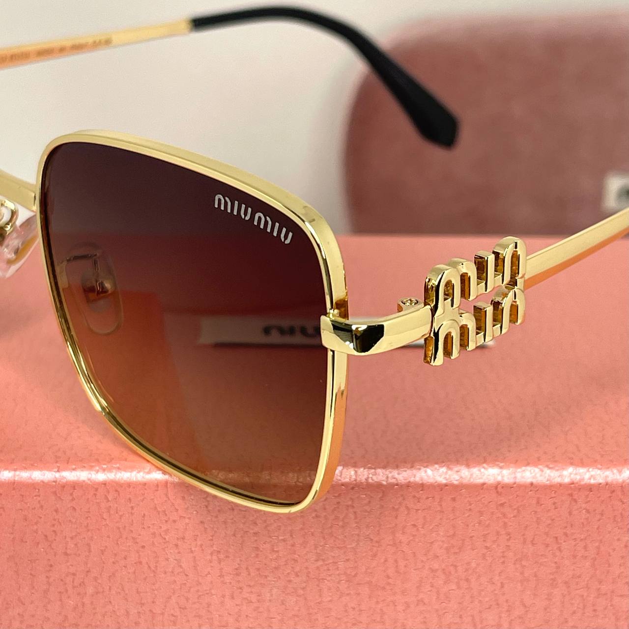 MIU MIU Bold Gold
