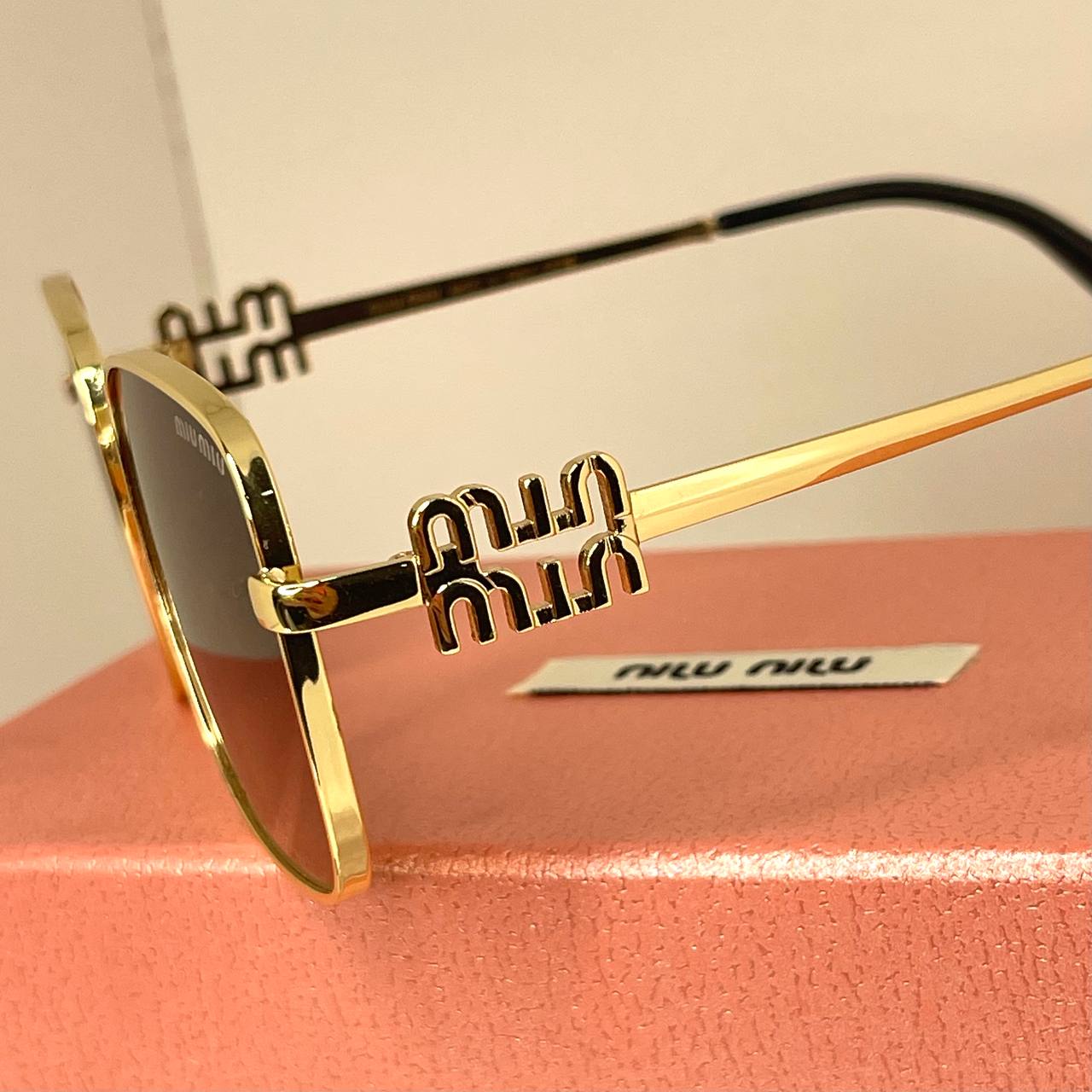 MIU MIU Bold Gold