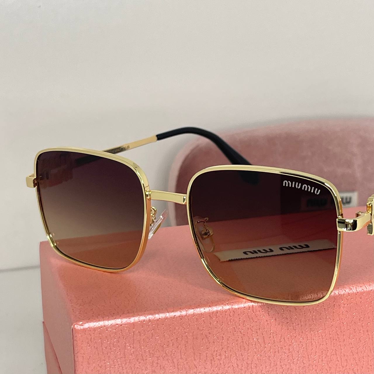 MIU MIU Bold Gold