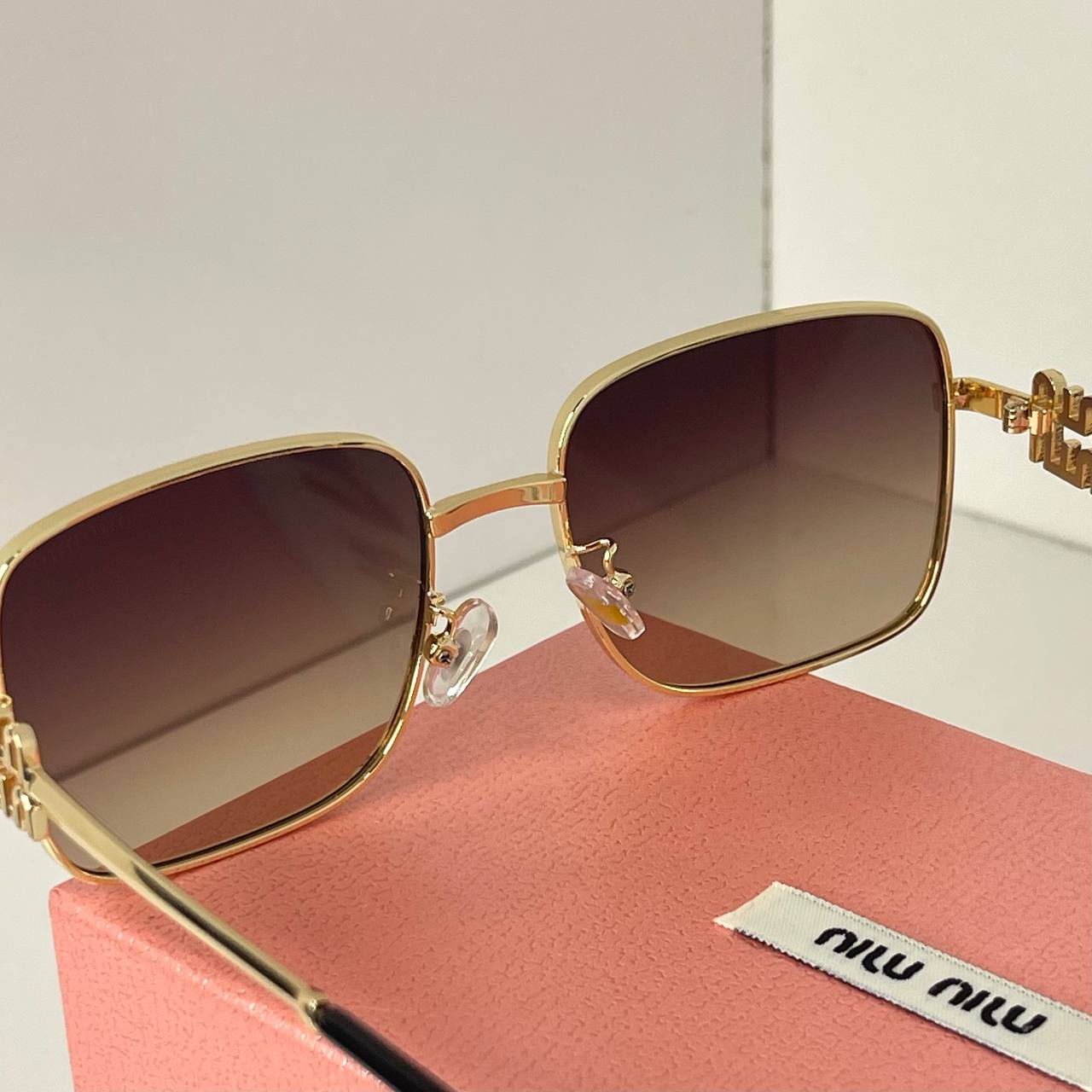 MIU MIU Bold Gold
