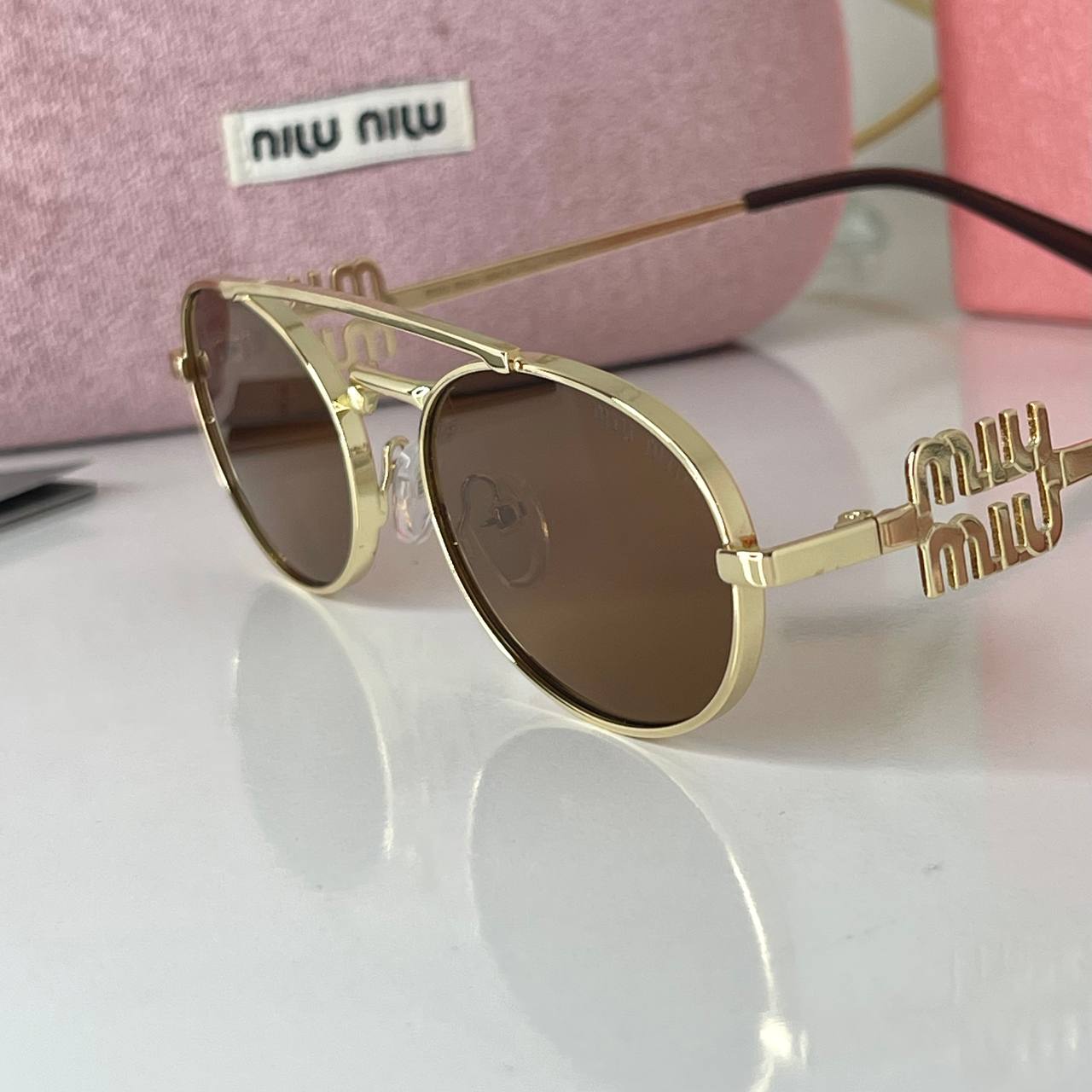 Miu Miu Soleil Gold