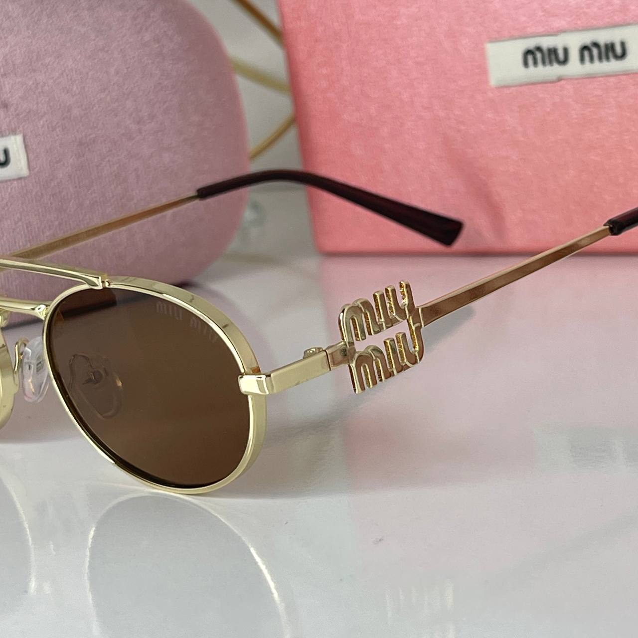 Miu Miu Soleil Gold